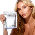 Blonde woman holding Equi London Beauty Sleep Edition against a white background
