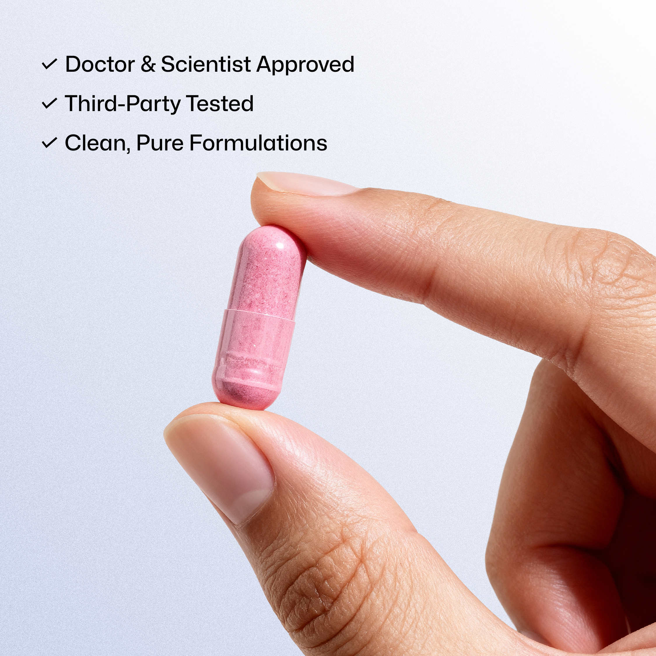 Pink capsule of Equi London Beauty Sleep Edition held between fingers with text about approval and testing on a light gray background