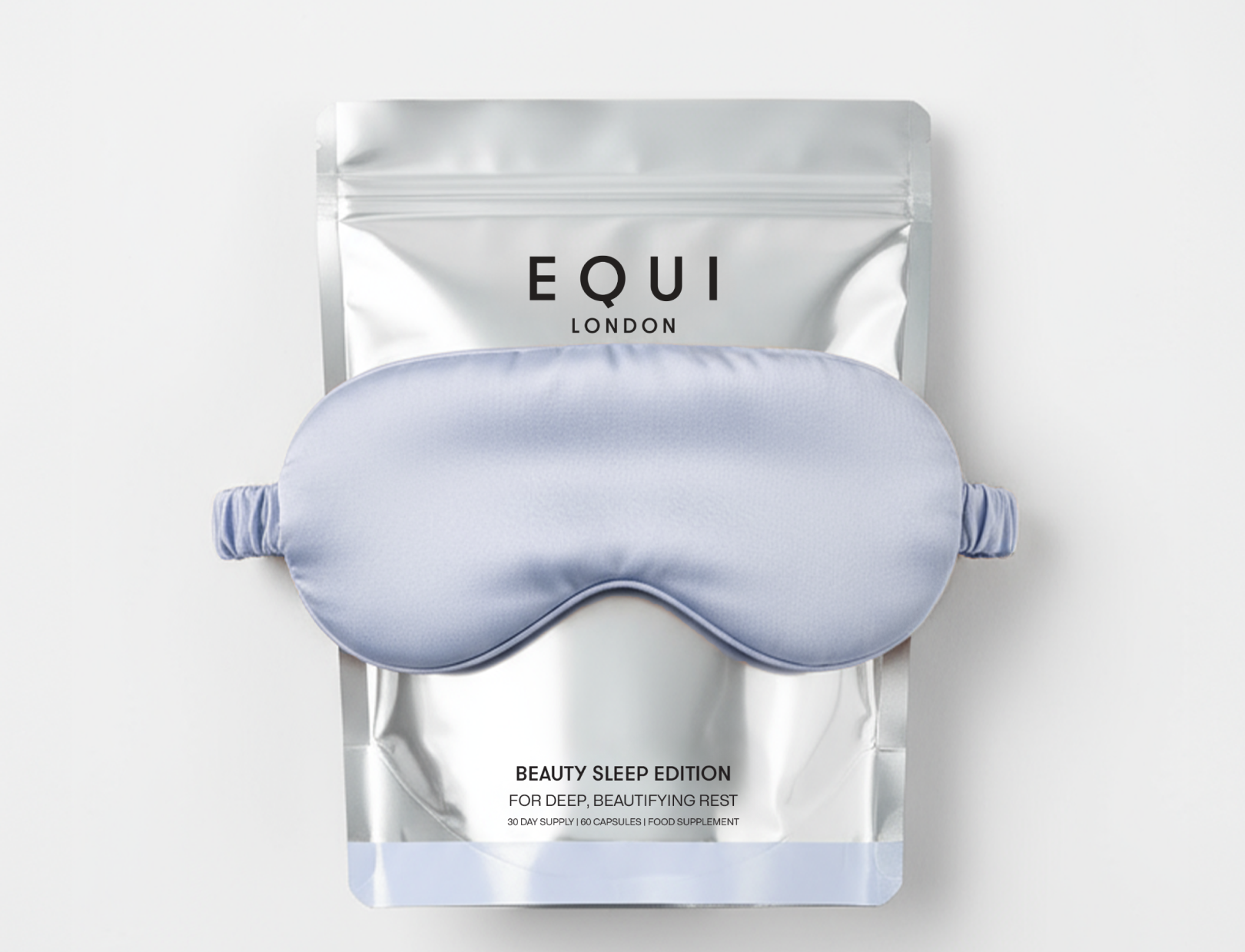 EQUI London Beauty Sleep Edition Pouch with a lilac silk eye mask around the packaging